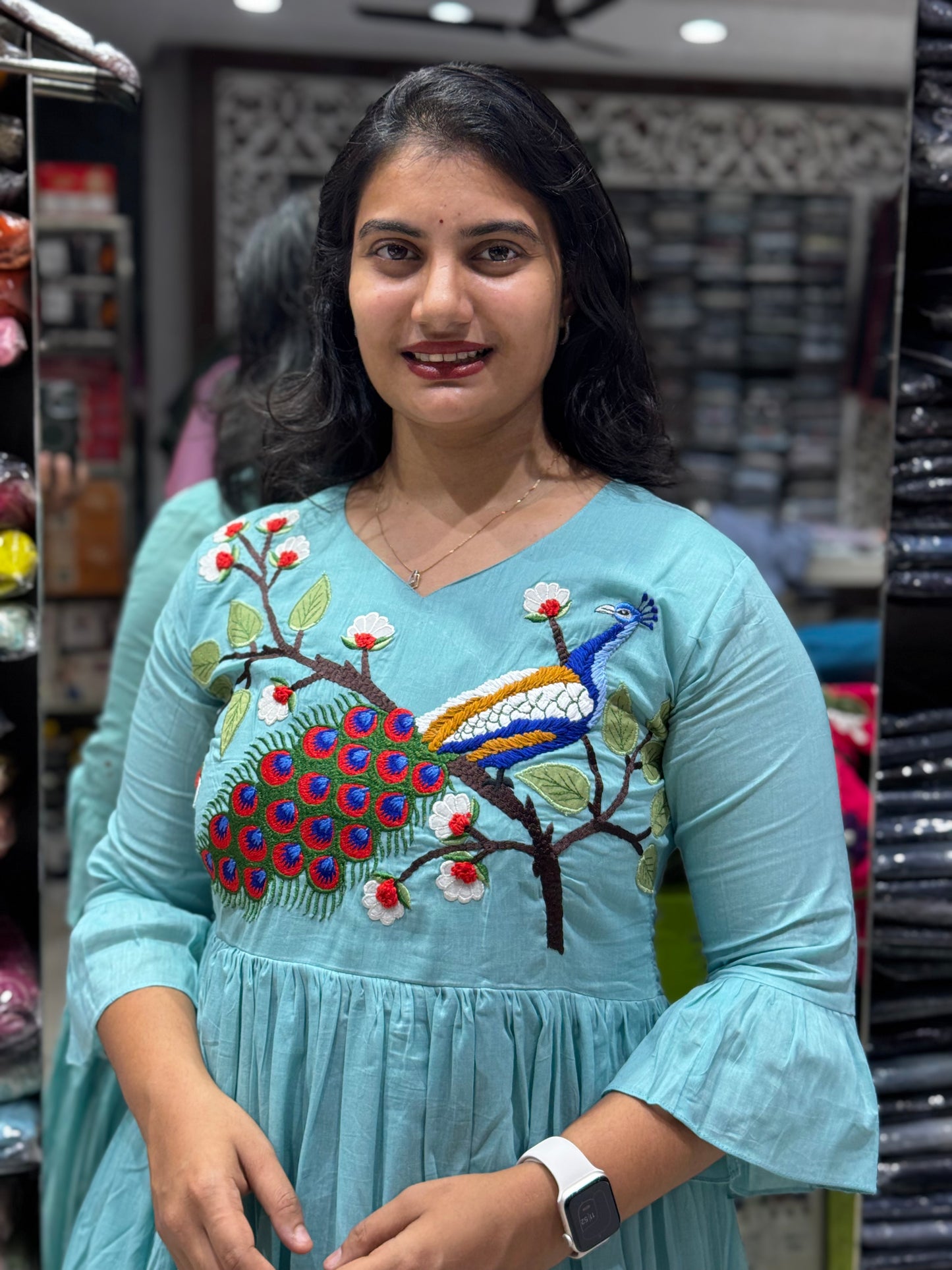 F110 Peacock mulcotton gown