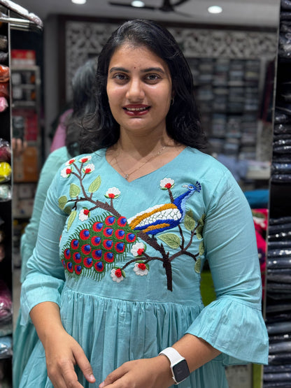 F110 Peacock mulcotton gown